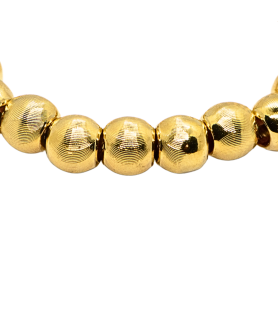 Bracelet à perles dorées...